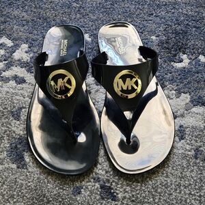 Michael Kors Black Lillie Jelly  Flip Flops with Gold Emblem Size 9M Like New